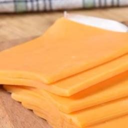 imagem Queijo cheddar fatia